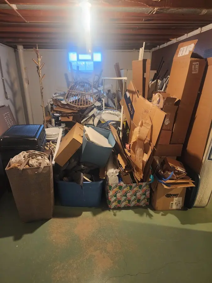 Roll-off dumpster container at job site for 15 Yard Dumpster Rental in Aurelius